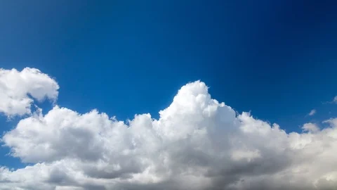 Clouds running across the blue sky. Stock Footage 98295497