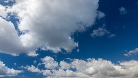 Clouds running across the blue sky. Stock Footage 98407719