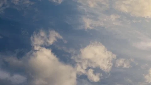 Clouds running across the rapidly darkening sky at sunset. Timelaps, 4K Stock Footage 76260600