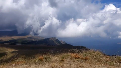 Clouds running over Bucegi Plateau Stock Footage 102225761