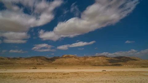 Clouds running over desert mountains in Arava Israel 4k time lapse Stock Footage 87491050