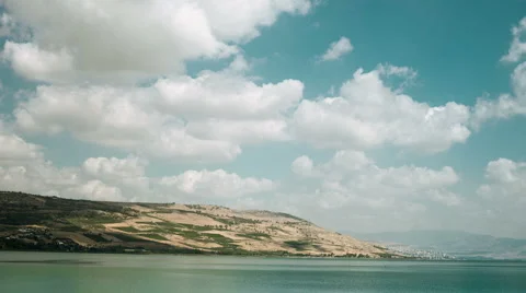Clouds running over the Galilee sea, with mountains and Tiberias on background Vídeo Stock 51848002