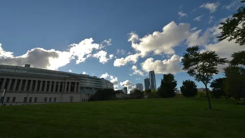 Clouds rush by Chicago's storied Soldier Field Stock Footage 70681268