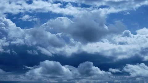 Clouds rushing across the sky - time laps Stock Footage 142279627