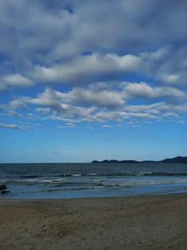 Clouds sailing in the blue sky Stock Photos