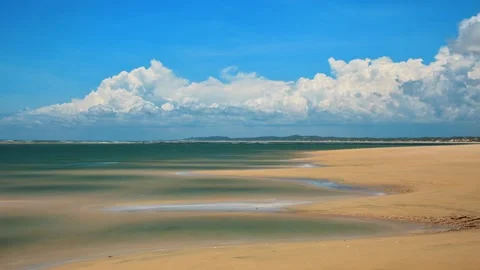 Clouds, sandy beach and turquoise water Stock Footage 155233054