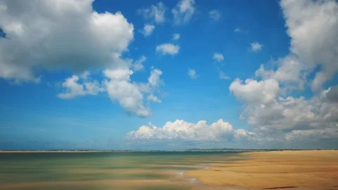 Clouds, sandy beach and turquoise water Stock Footage 155233211
