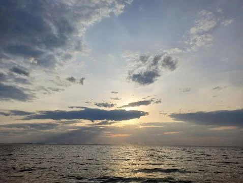 Clouds on the sea during sunset 스톡 사진