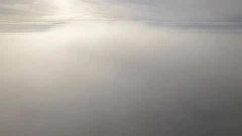 Clouds seen from above with blue sky on horizon time lapse Stock Footage 221839066