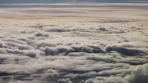 Clouds as seen from an airplane 4k 30fps video Stock Footage 257577095