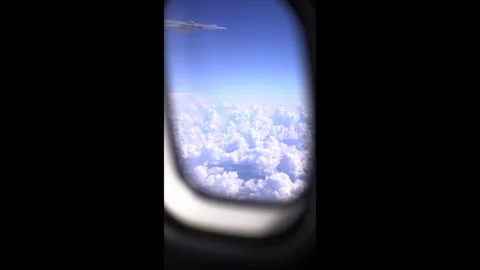 Clouds seen through airplane window. Stock Footage 283619882