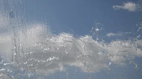 Clouds Seen Through a Waterfall Clean Vídeo Stock 39959036