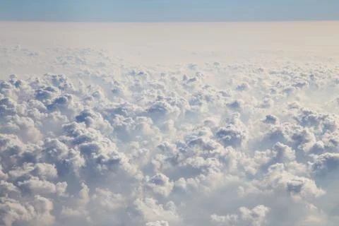 Clouds as seen through window of an aircraft Stock Photos
