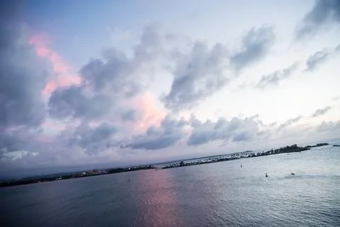 Clouds setting over the ocean in San Juan, Puerto Rico. Stock Photos