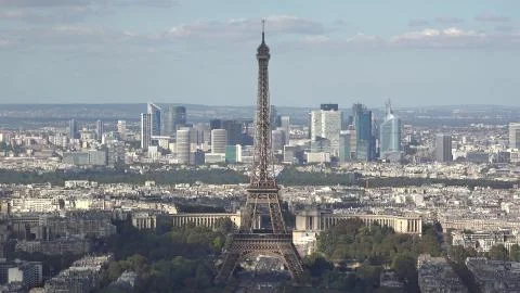 Clouds shadows over the Eiffel tower and buildings of Paris Stock Photos