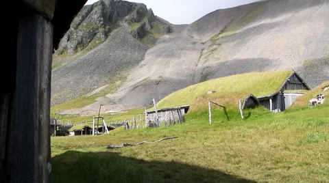 Clouds shadows over epic viking village, dolly camera Stock Footage 56996048