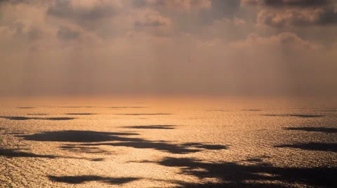 Clouds with shadows on the sea passing Ikaria greek island - Timelapse Stock Footage 41829016
