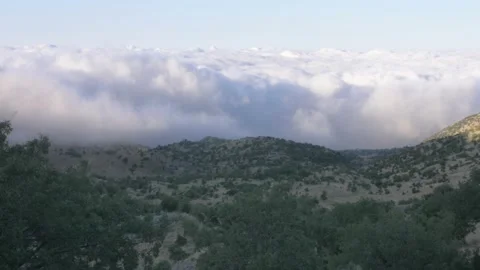 Clouds shrouding the Golan Heights from Mount Hermon Stock Footage 137565280