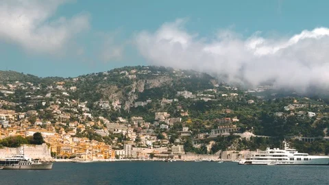Clouds sit on the mountains of Nice. Stock Footage 109607128