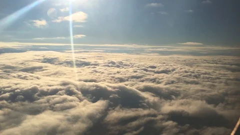 Clouds in the sky from aircraft windows Stock Footage 98837877