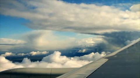 Clouds in the sky from an airplane Stock Footage 32578345