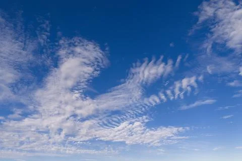 Clouds on sky background blue cloud texture. Bright clouds soft white patte.. Stock Photos