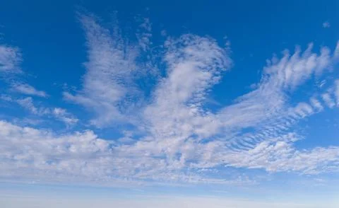 Clouds sky background blue texture. Soft white clouds pattern. Bright dayli.. Stock Photos