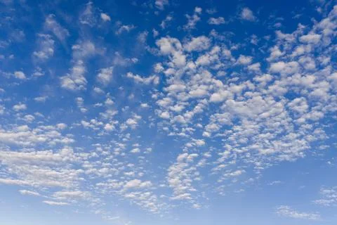 Clouds on sky background blue texture. Bright clouds soft white pattern. Dayt Stock Photos
