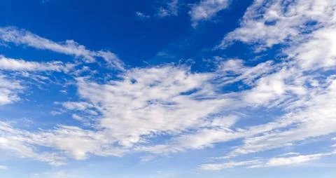 Clouds on sky background blue texture. Bright clouds soft white pattern. Daytime Stock Photos