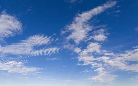 Clouds sky background texture blue. Soft white clouds pattern. Bright dayli.. Stock Photos