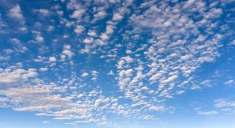 Clouds on sky background texture. Bright clouds soft white pattern. Stockfoto's