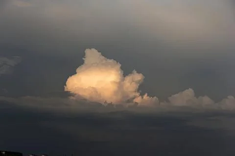Clouds in the sky with dramatic dark and light shades Stock Photos
