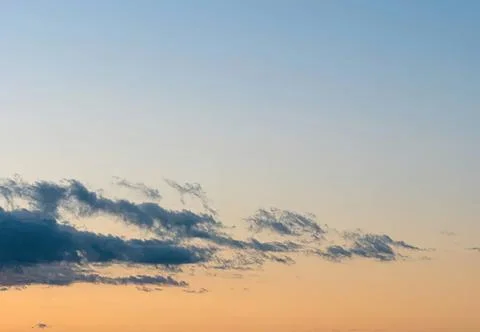 Clouds in the sky during sunset with colorful sky Stock Photos