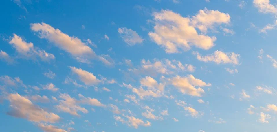Clouds in the sky during sunset Stock Photos