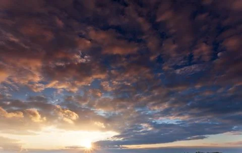 Clouds in the sky at dusk. The sky before sunset Stock Photos