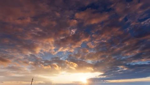Clouds in the sky at dusk. The sky before sunset Stock Photos