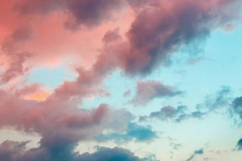 Clouds in the sky illuminated by the setting sun. 写真素材