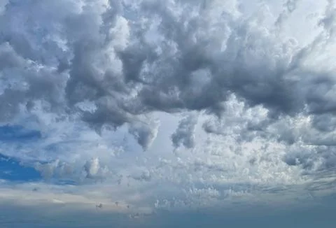 Clouds in the sky just before sunset. Clouds and blue sky Stock Photos