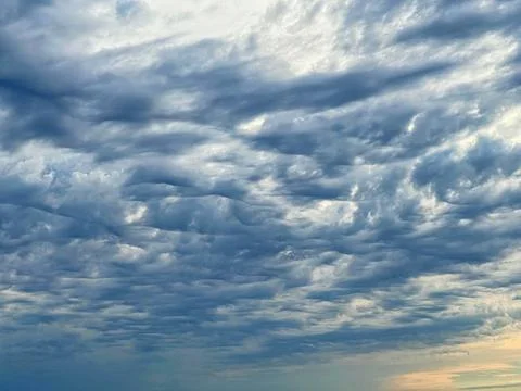 Clouds in the sky just before sunset. Clouds and blue sky Foto stock