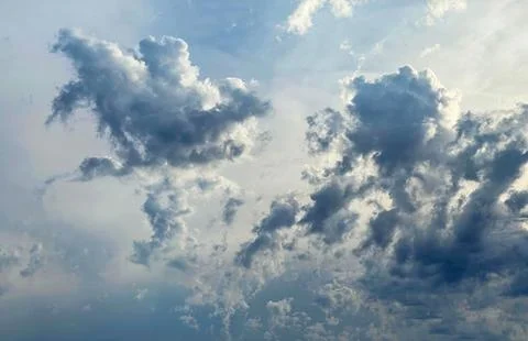 Clouds in the sky just before sunset. Clouds and blue sky Stock Photos