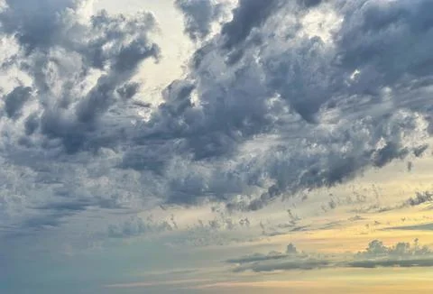 Clouds in the sky just before sunset. Clouds and blue sky Stock Photos