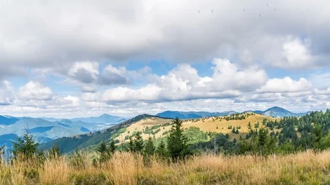 Clouds sky moving fast over mountains nature in sunny autumn Time lapse Stock-Footage 116104870