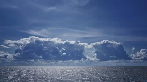 Clouds in the sky over the Baltic Sea. Stock Photos
