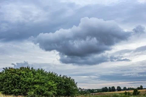 Clouds in the sky over the field Stock Photos