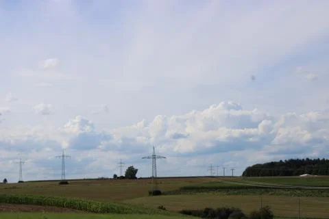 Clouds in the sky over powerlines Stock Photos