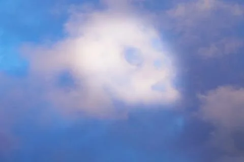 Clouds in the sky in the shape of a ghost, clouds in the sky in the shape of  Stock Photos