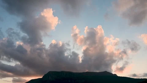 Clouds on the sky at sunset. Clouds over the mountain in summer. Stock Footage 282513942