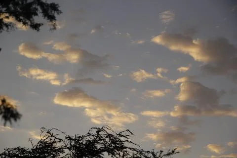 Clouds in the sky at sunset Stock Photos