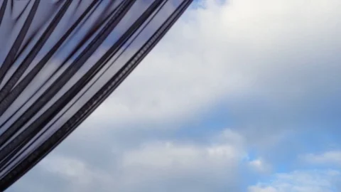Clouds in the Sky Through a Veil Stock Footage 71280766