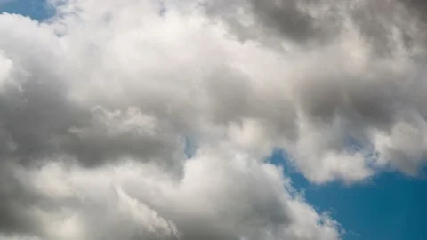 Clouds in the sky - Time lapse video background - 4K 30p Stock Footage 130870964